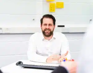 Medical Design Development Engineer, Danny in a team meeting in a design studio