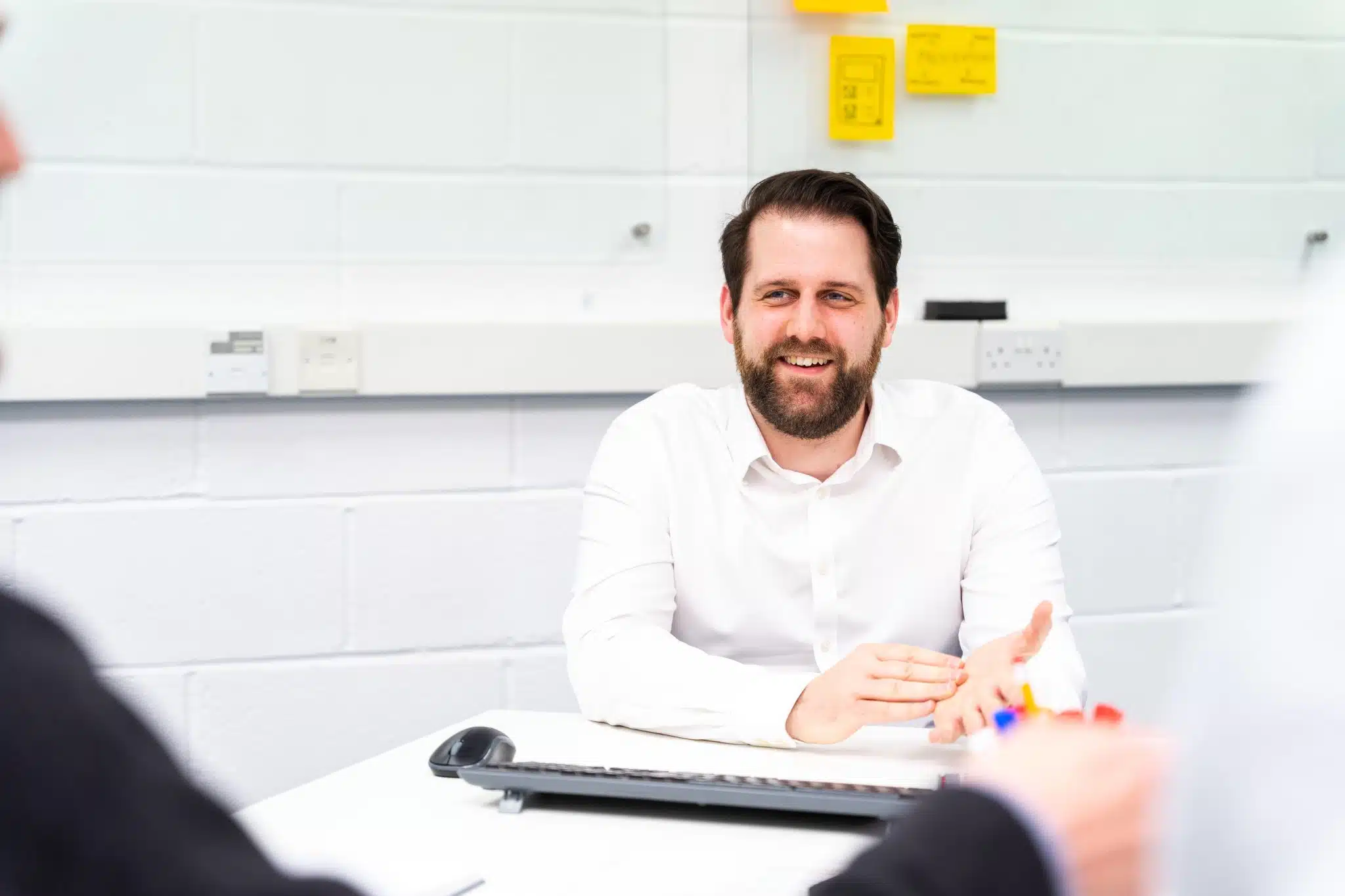 Medical Design Development Engineer, Danny in a team meeting in a design studio