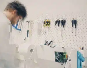 Electro-Mechanical Medical Device Design Services, Mechanical design engineer building up a prototype of a piece of laboratory equipment
