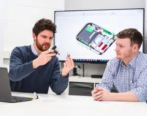 Medical Device Engineers reviewing an inhalation device to write a design and development plan