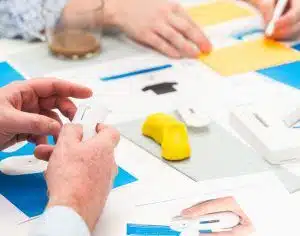 Design engineer testing medical device prototype concepts