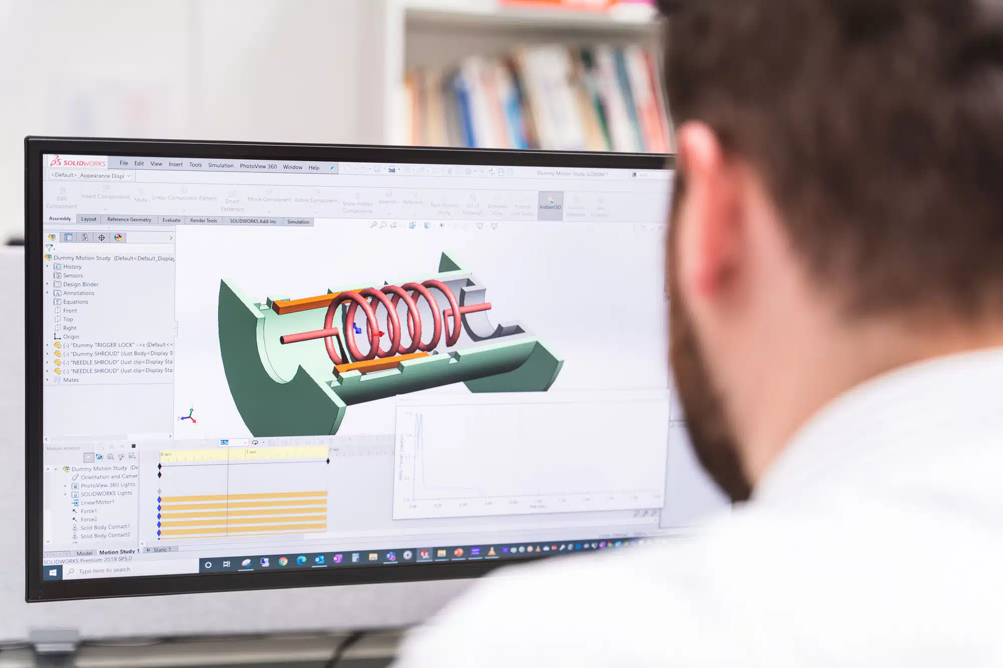 Design engineer using CAD and FEA to improve an inhalation medical device design robustness with sensitivity analysis
