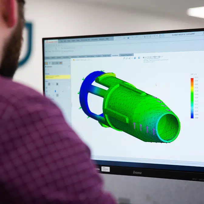 Medical Device Design Engineer conducting finite element analysis study on autoinjector medical device component (FEA)