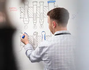 Medical device design consultant brainstorming autoinjector feature concepts