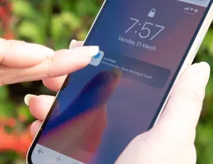 Patient using a medication reminder app